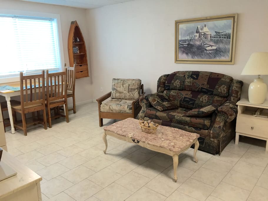 Area to eat, & place to put your feet up. Couch pulls out if 1 of the 4 of you wants to sleep alone!