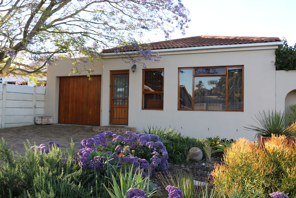 Outside of flat with single lock-up garage.