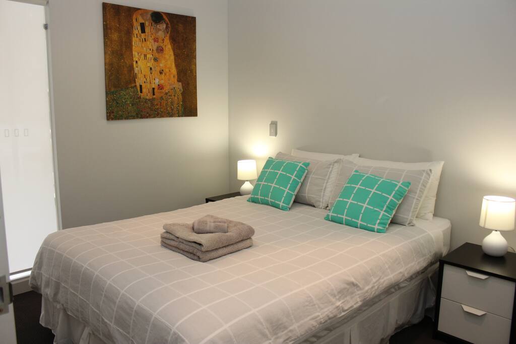Bedroom with blinds drawn