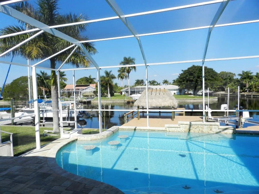 Lanai View Across Pool and Gulf Access Canal