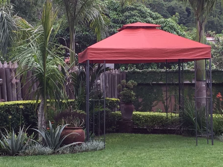 Permanent gazebo under which to sit, take a drink, read a book.