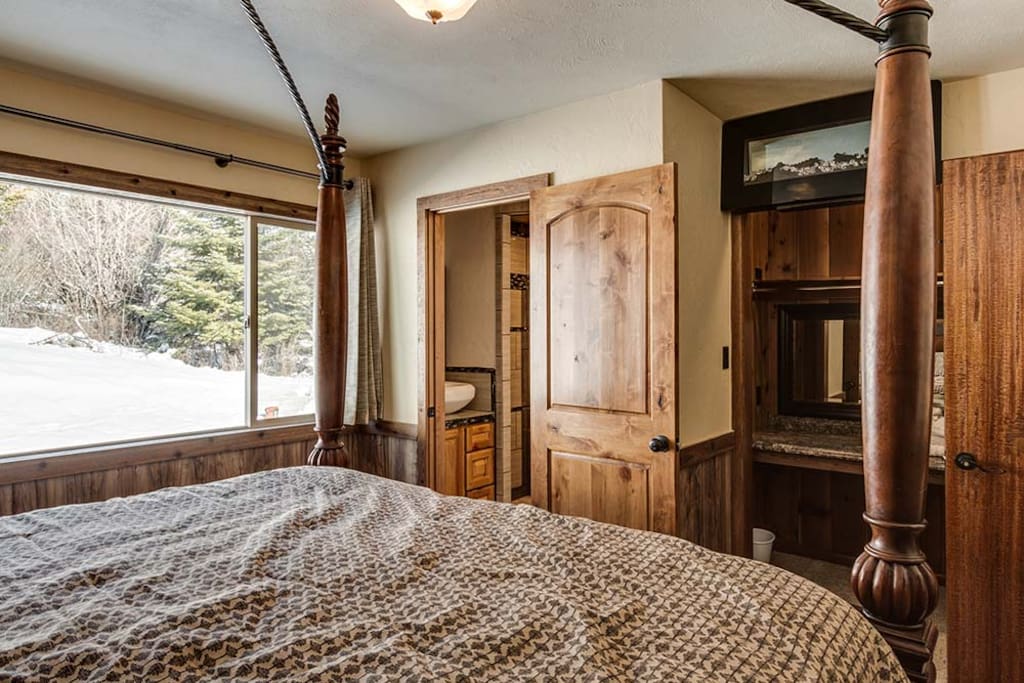 The Mahogany, features a wine cooler stocked with soft drinks, a large counter with mirror for a gal to do her makeup or to set up your computer. Do your Hot Chocolate, Hot Cider or Coffee in room with your own Keurig. A snack basket
is in the room. Closet hanging for 3/4 length garments. Lots of natural light or pull the shades.