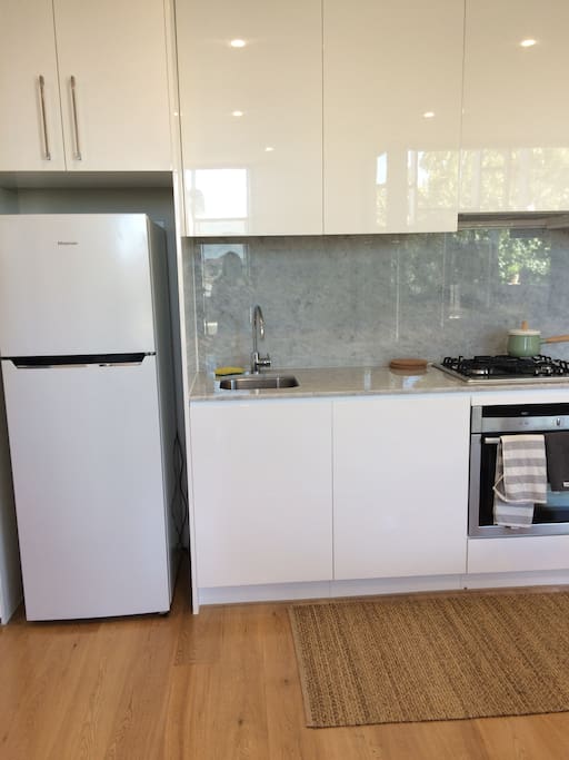 Kitchen (Dishwasher, oven, stainless steel appliances)