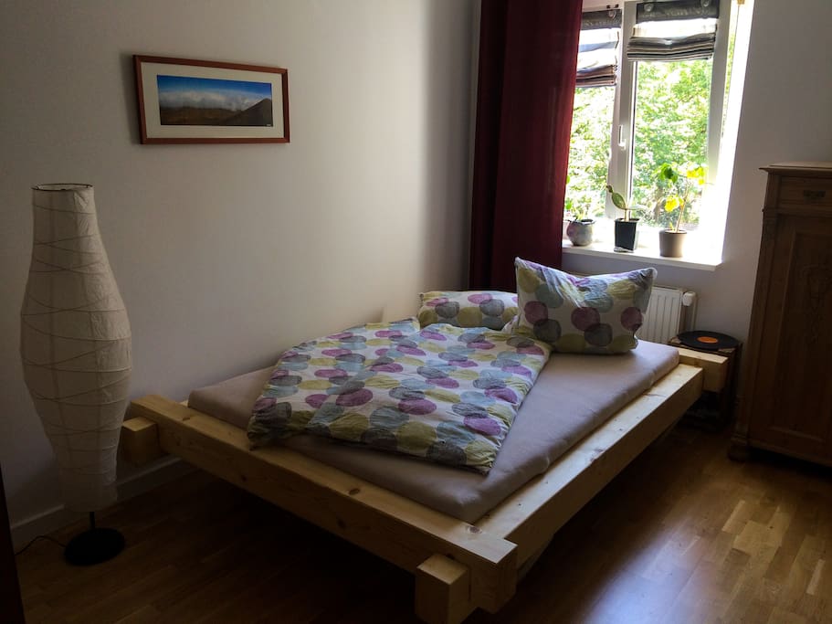 Queensizebed made of wood.
