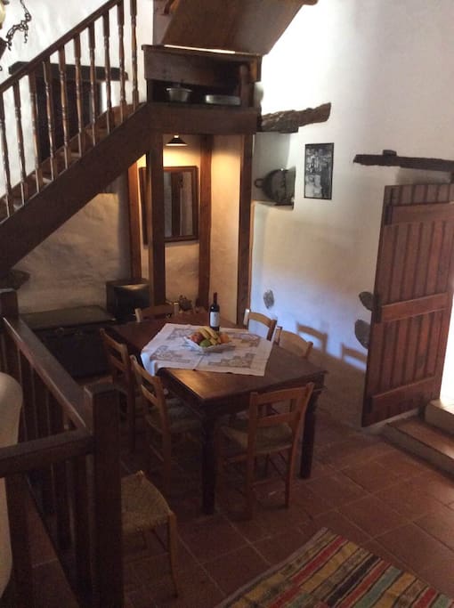 The dining table on the lower lever of the living room sits comfortably up to 6 guests.