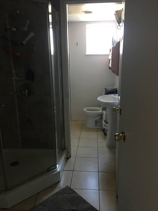Double Bathroom w/ Stand up shower and bath tub. This is a shared area in the apartment.