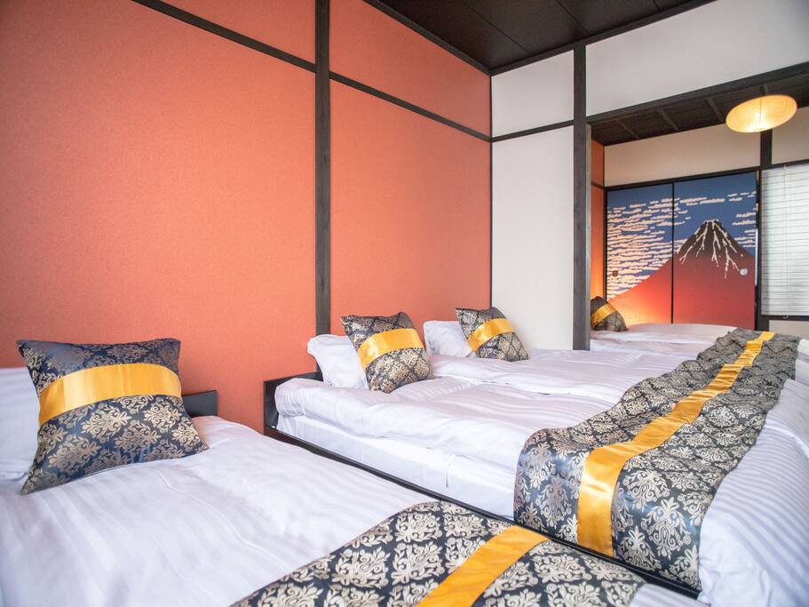 This facility has a hotel business license from Kyoto city.
Traditional Japanese style clean
rooms in Kyoto.The attractive red Fuji's sliding door.It is 6 minutes by Kintetsu train from Kyoto station. 2 stops from Kyoto station to Jujo station. 2 minutes on foot to the facility. It is 700 yen by taxi from Kyoto Station to the facility to about 5 minutes.5Free rental bicycles and free rental Wi-Fi and portable Wi-Fi are available.There are plenty of restaurants and convenience stores near the facilities.There are famous nearby tourist attractions, Yasaka Shrine, Nijo castle, Heian Shrine, Kiyomizu Temple, Kodaiji temple, Nanzenji, Eikan temple, Toji temple, Fushimi-Inari Taisha shrine, Tofukuji temple, Nishi Honganji temple.Cherry blossoms will bloom from late March to early April. There are many sakura sights.The Gion Festival is a long festival at Yasaka Shrine, which takes place over the course of a month from July 1st in a summer tradition of Kyoto. July 14th - 16th of the pre-festival is "Yamahoko" is the most enjoyable period.The open-air Goemon bath.