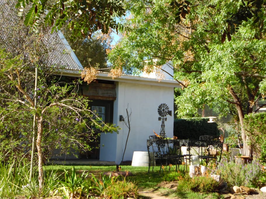 Shady veranda welcomes guests