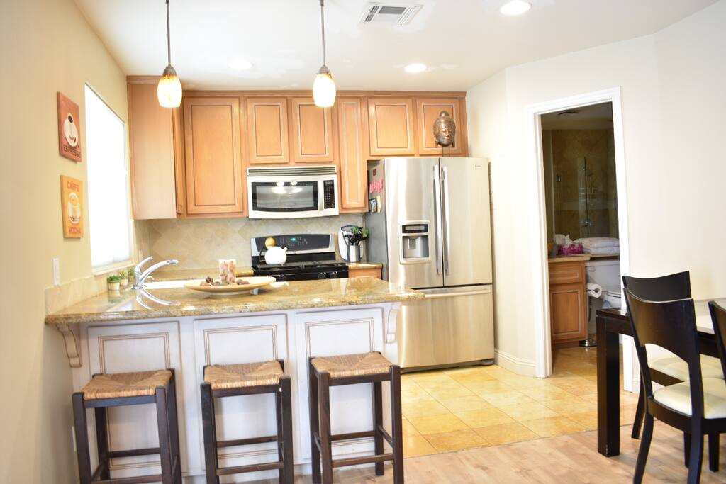 Kitchen. Stainless steel fridge/gas stove