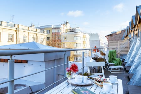 Attic with terrace in the heart SPb