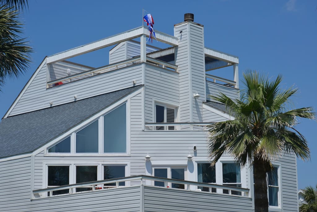 Exterior of home showcasing the 3 decks.