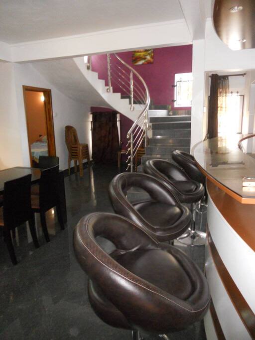 Stairs that leads upward to rooms and terrace.