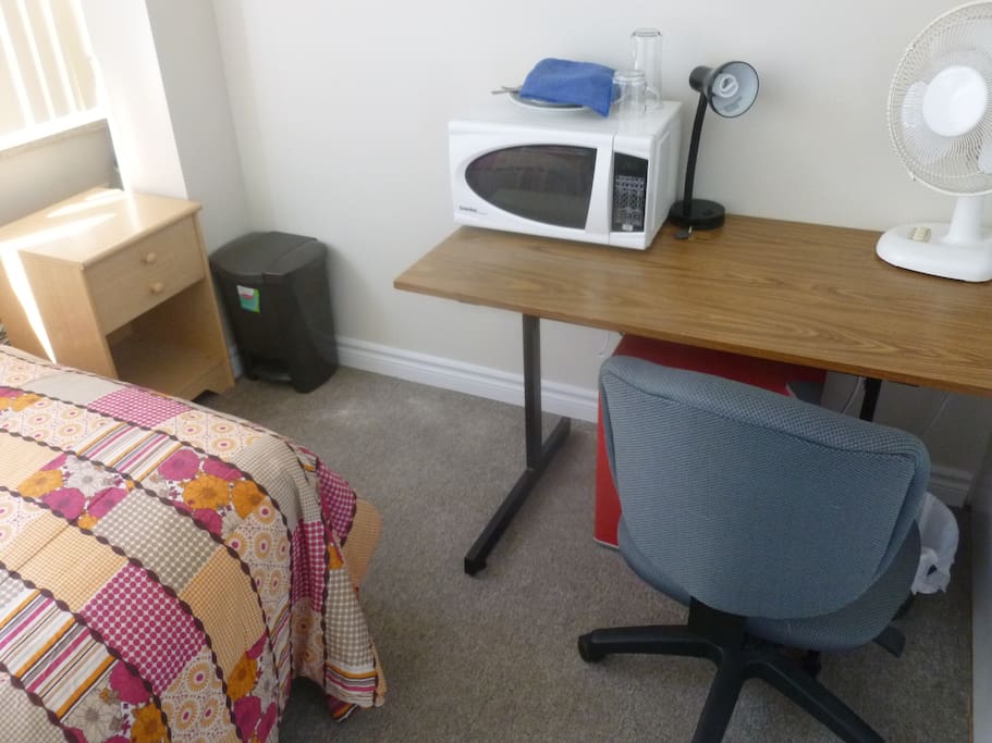 Writing desk, fridge & microwave for your convenience!