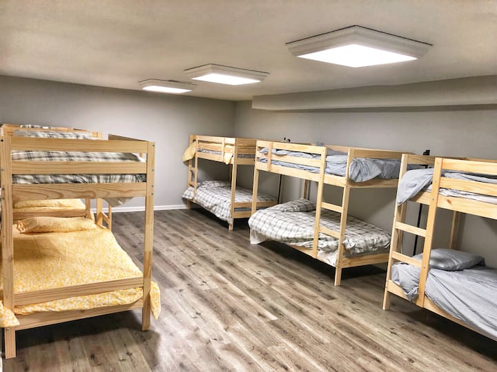 Bunk Room with laminate flooring and 5 bunks for total of 10 beds!
