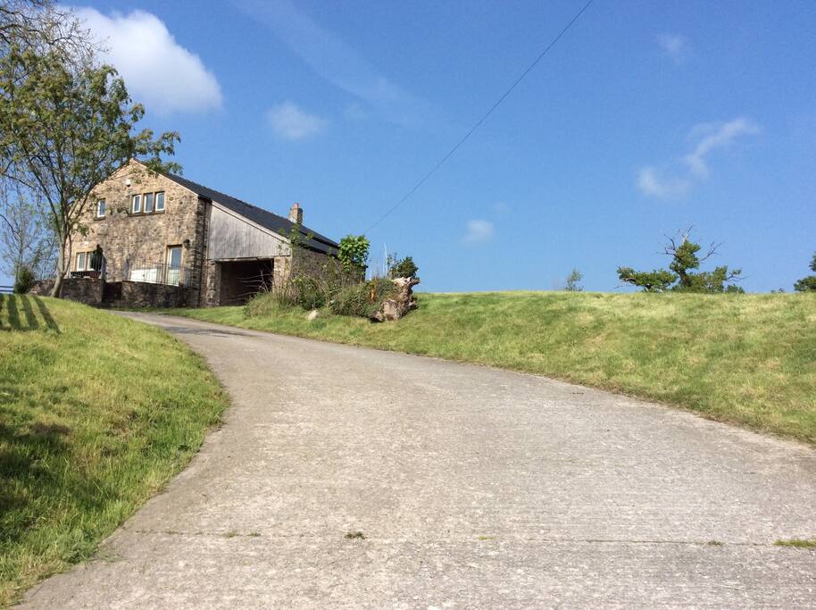 Private drive off a designated quiet lane with amble hard standing off road parking.