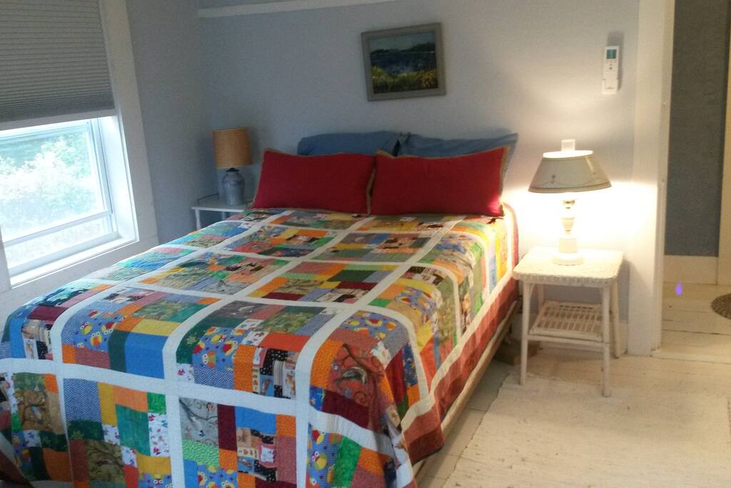 Full size comfortable bed. Has own controls for heat and air. Lots of light with block out shades