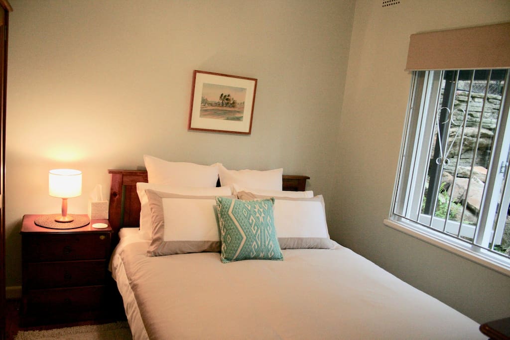 Queen bed, bright and airy room with sunblock blind for those who enjoy a sleep in.