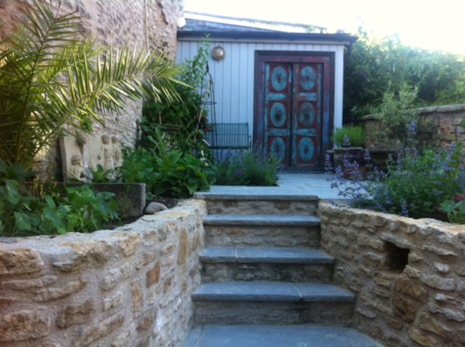 A bit of the garden, plus Indian doors