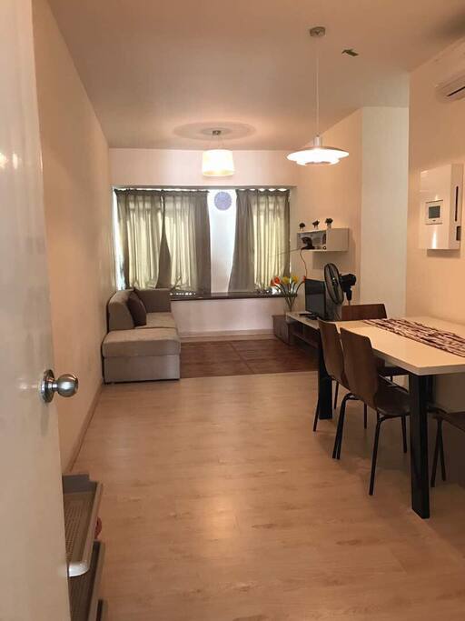 Living Room with Aircond and Stand Fan