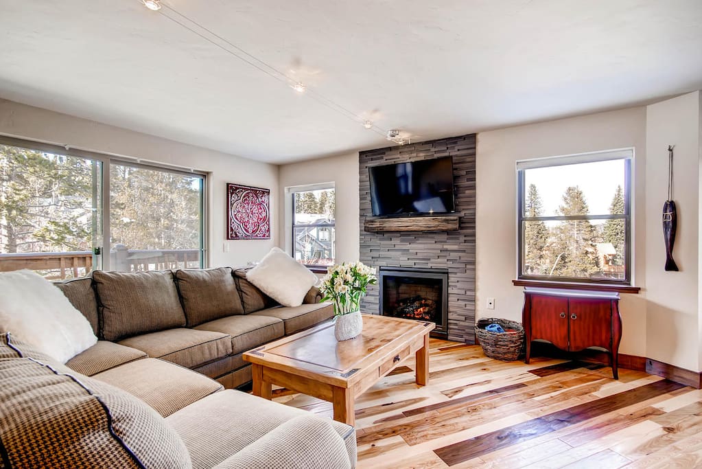 Open hang-out space! A plush couch surrounds a modern fireplace and 47" HDTV that comes with over 100 channels including HBO, Showtime, Encore, etc. AND we have streaming Netflix!