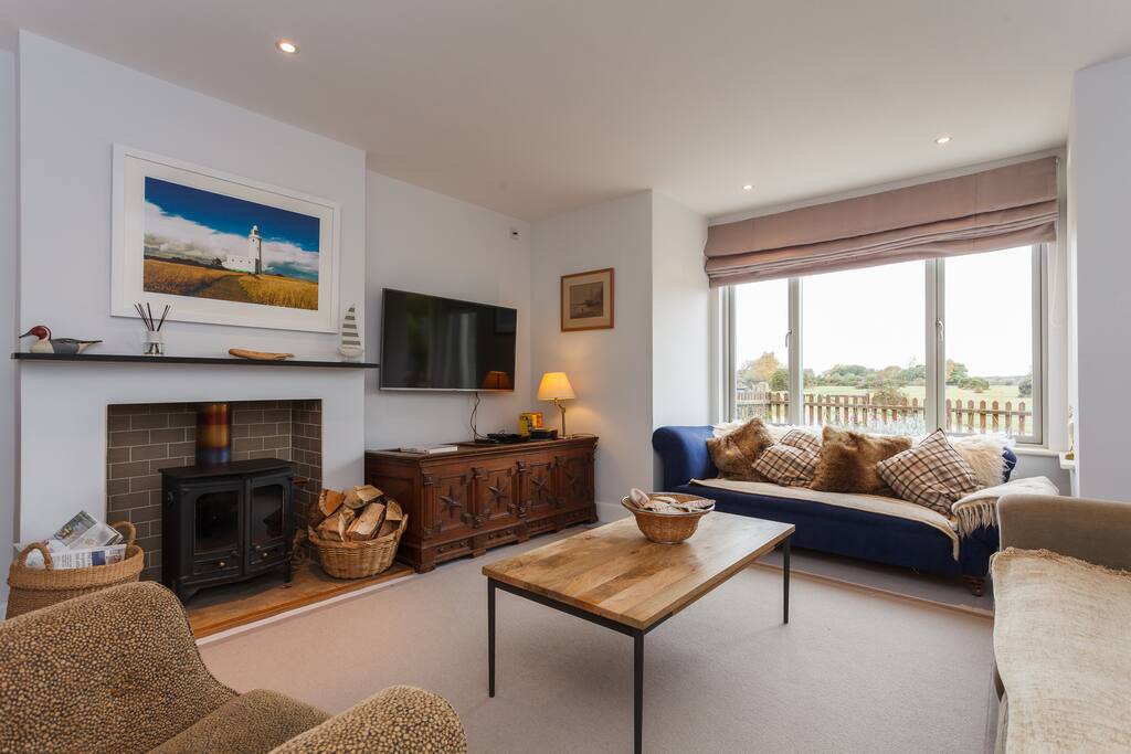 Big comfy sitting room with amazing view. And TV for when its dark!