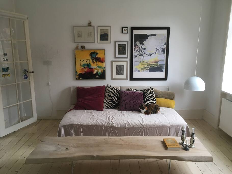 Living room with couch - or bed for one or two persons.