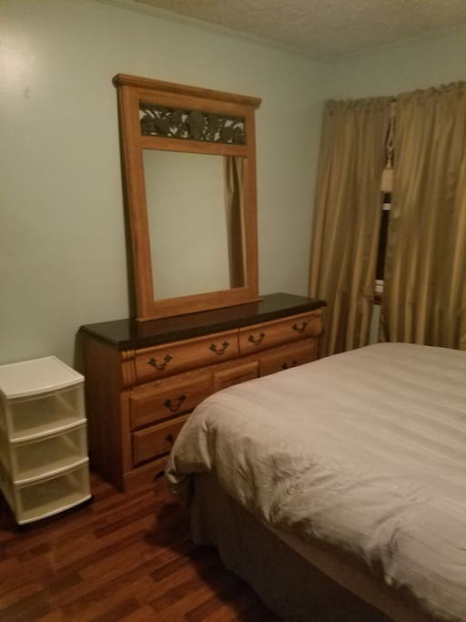 Guest private Queen bed with goose down duvet cover for two...