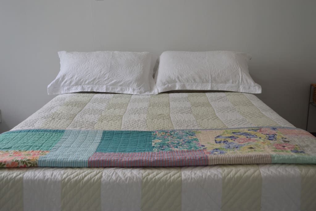Double bed in main bedroom.