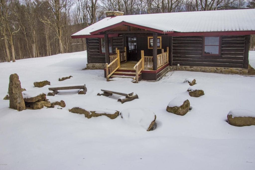 The back porch has a fireplace
