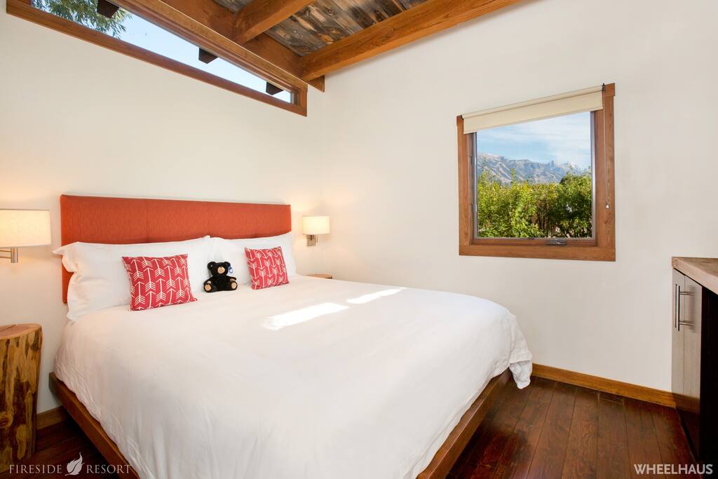 King-sized bed with goose down comforter, European style duvet and luxury lines.