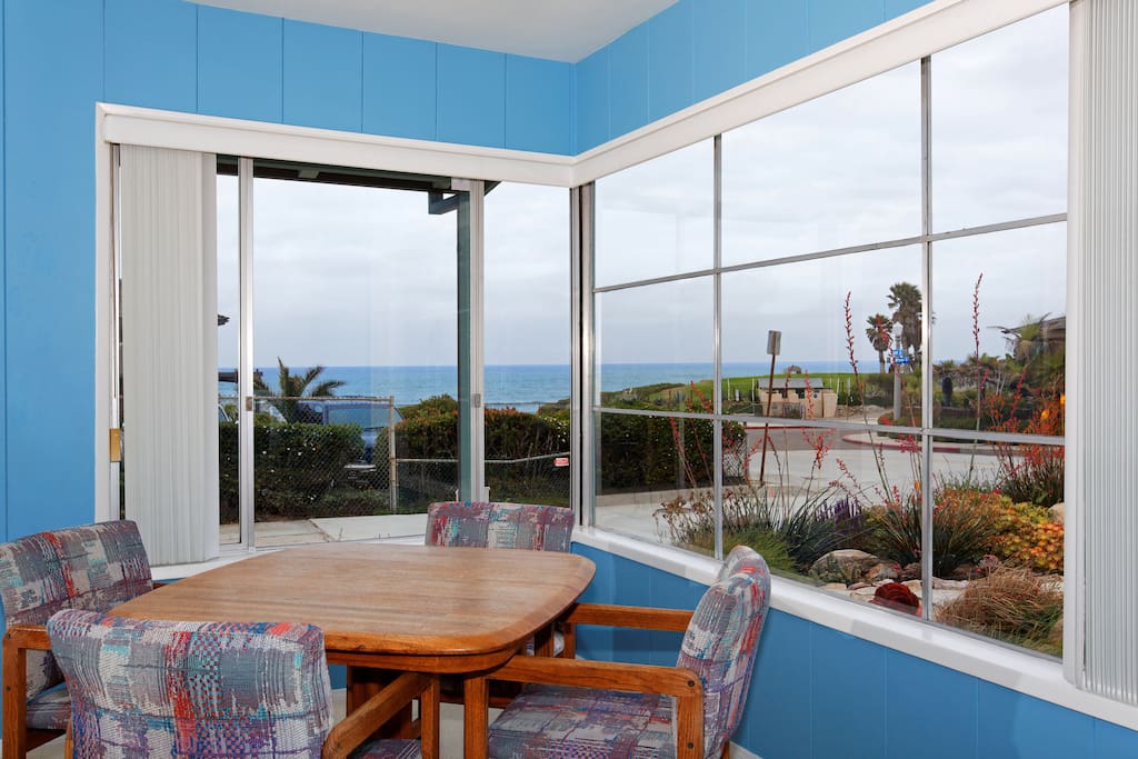 Living/dining room combination with ocean view.