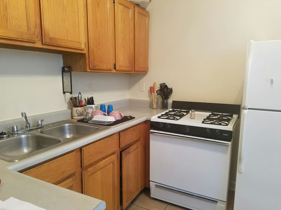Full kitchen with dining table. Seats two. I do not use microwaves but I have a lovely stove :)