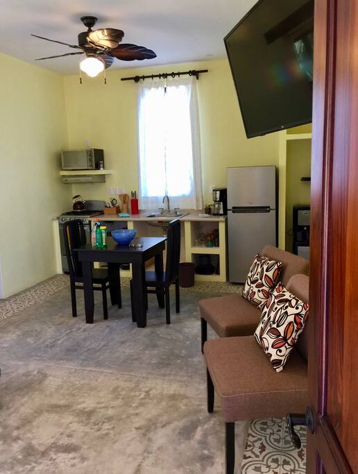 Swivel TV viewable from dining area or bed