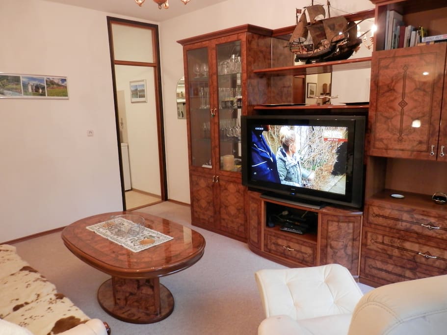 Large flatscreen TV with cable channels and DVD