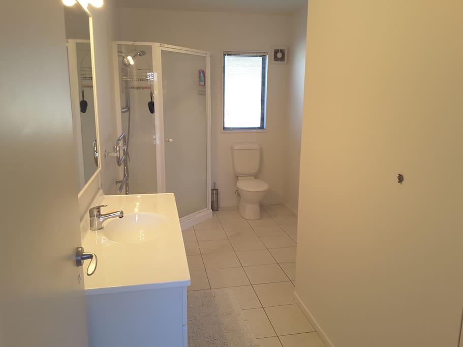 This large bathroom has a connecting door to your bedroom space so becomes the ensuite.