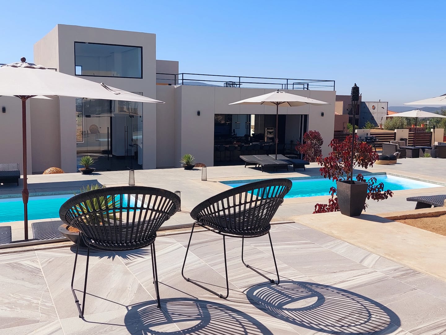 Chairs and a table on the courtyard terrace