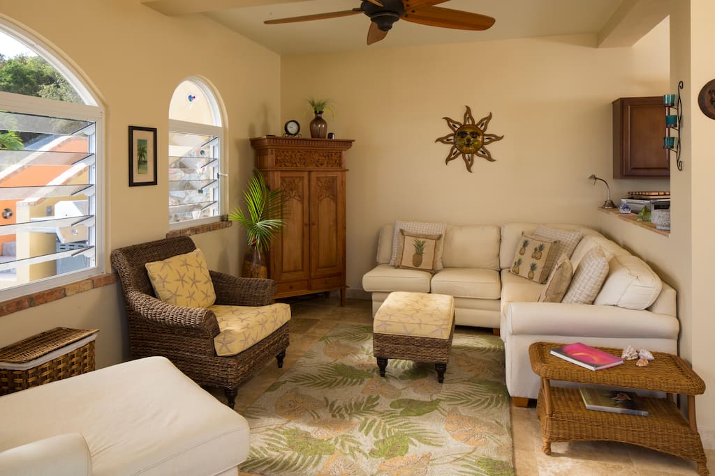 Living room, TV inside teak cabinet