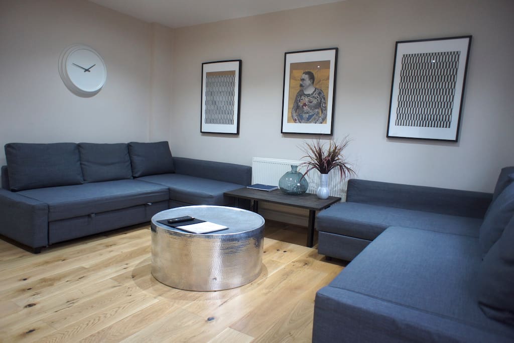 Here's your living room with two double sofa-beds