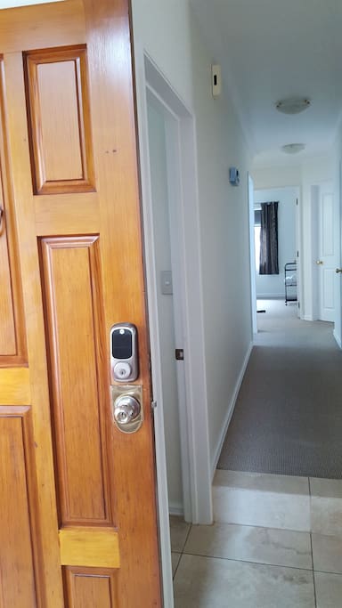 Code entrance. Passage from front door to guest bedroom