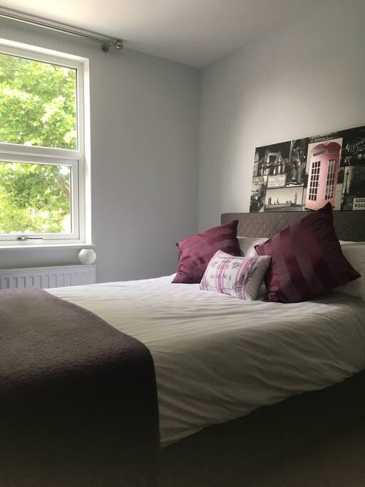 Large double bedroom with view of the Shard