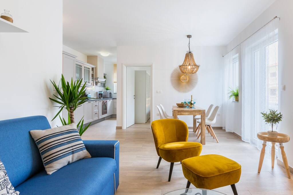 Living room, Dining room and Kitchen in one unit and direct access to Terrace e and Bedroom 2.