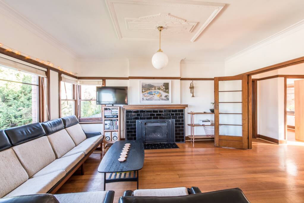 Lounge Area with TV, Xbox, Stereo and super comfy mid century couch & armchairs