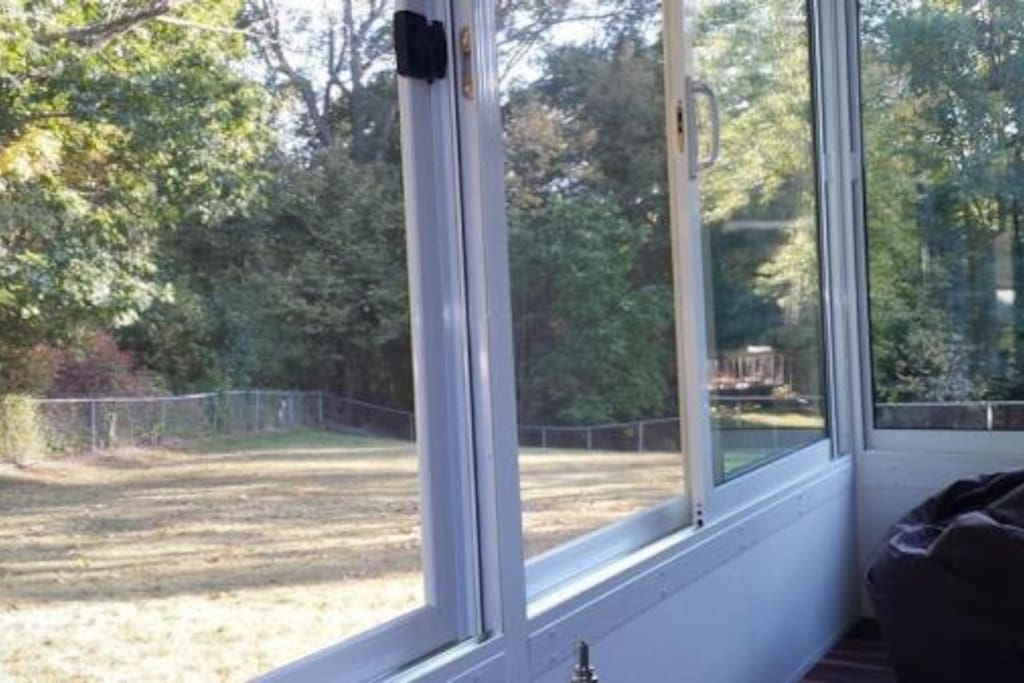 New sunroom! Perfect to sit back and enjoy wine, coffee, tea... or for your smoke break! Smokers OUTSIDE only.