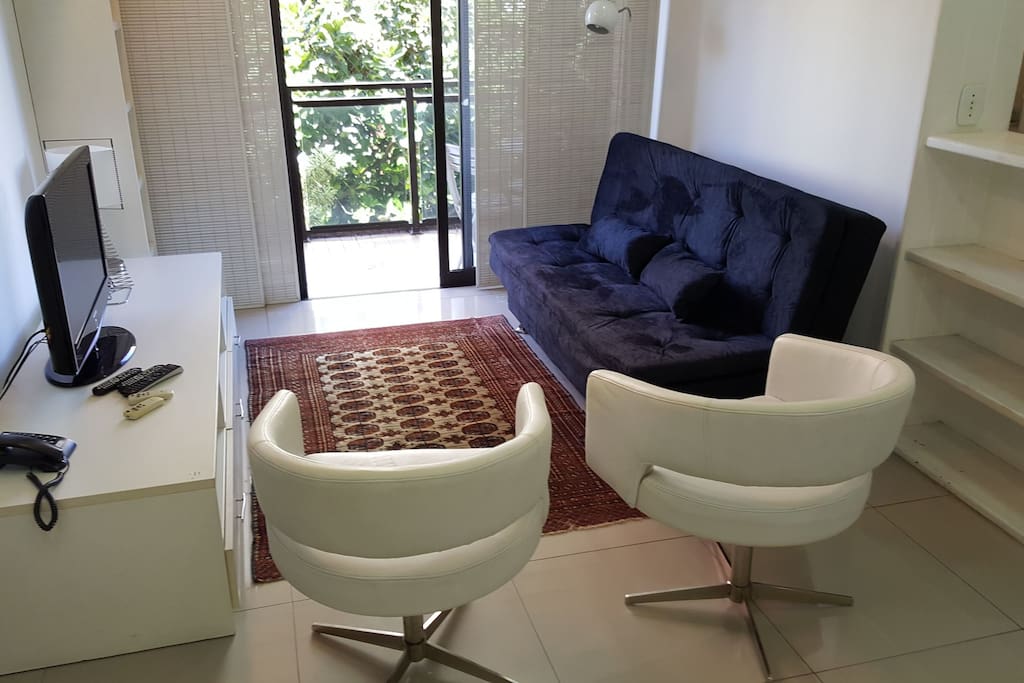 Sala com sofa-cama