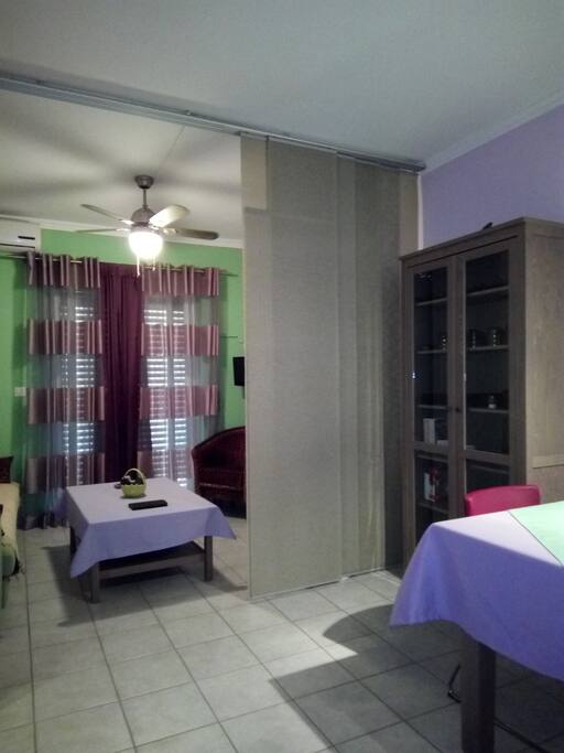 The living room can be separated with panels from the rest of the house and turn into a private bedroom
