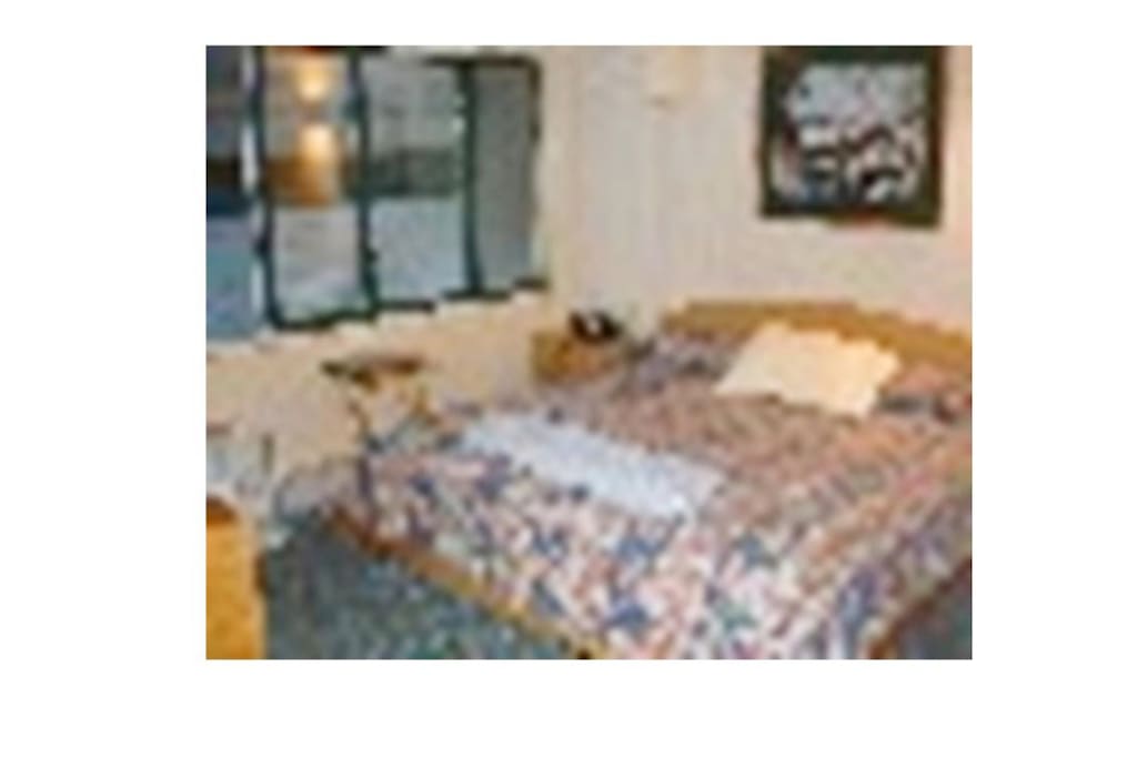 Master BR King size (not Queen) bed with private bathroom en suite and TV. All linens included.