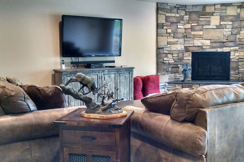 Sit by the fire and relax in your super comfortable living area.