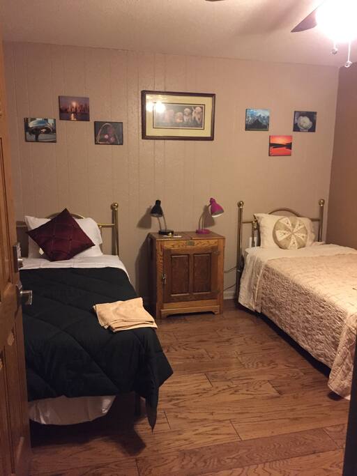 Sleeping room with two doubles shared bath
