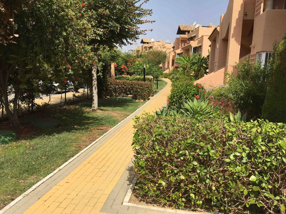 Tree lined walkway to our apartment within the secure fenced grounds, accessible by key fob’s which are only provided to owners / guests.