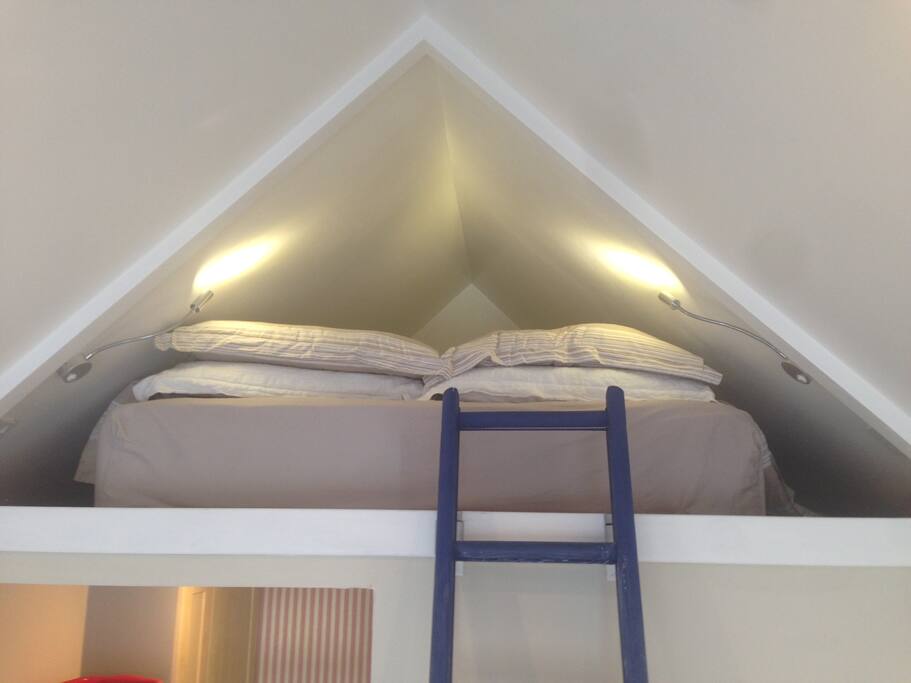 King sized bed at mezzanine level
